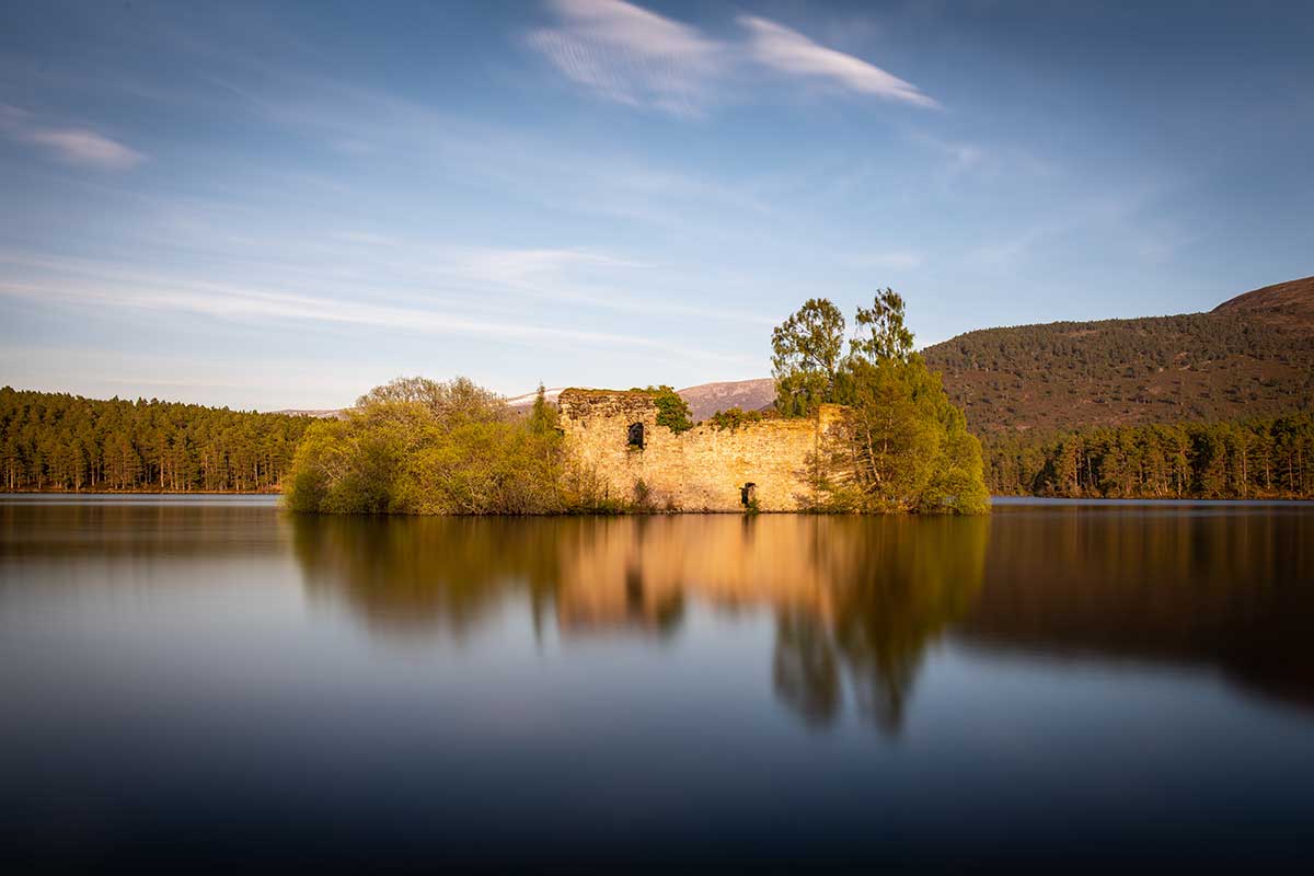 Reflections at Loch an Eilein Castle - Cairngorms landscape photography by Stephen Banks